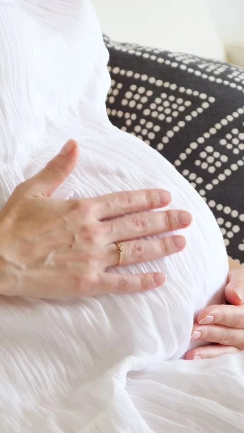 Gentle Fingers Gently Support Expectant Mother. Soft Palms Carefully Embrace Vídeo Stock 334903760