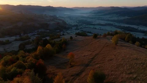 Gentle Forward Drone Shot Bringing Sunrise Into Frame Video stock 290871275