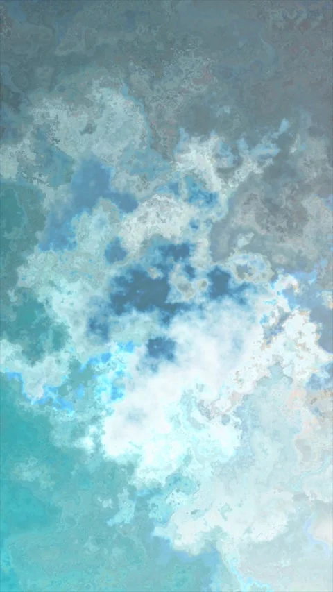 Gentle ocean waves lap against the shore under the clear blue sky Stock Footage 311951065