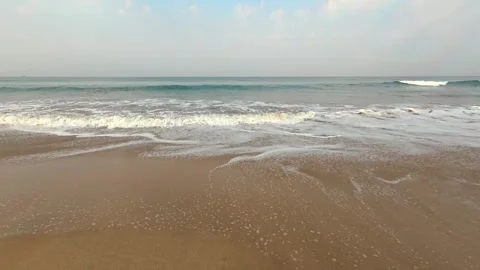 Gentle Ocean Waves Lapping on Sandy Shore | 4K Cinematic Beach Ambience Stock Footage 331562176