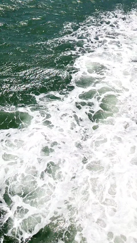 Gentle Ocean Waves Passing in Daylight, Real-Time Fixed Shot Stock Footage 330627407