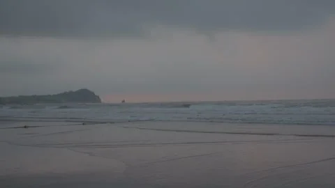 Gentle Ocean Waves Rolling at Sunrise - Misty Morning Sea Stock Footage 336797230