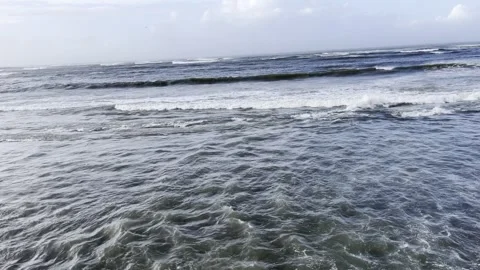 Gentle Ocean Waves Rolling Toward Shore Video stock 328120036