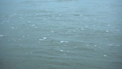 Gentle Ocean Waves Rolling Towards The Shore On A Cloudy Overcast Rainy Day Stock Footage 342207295