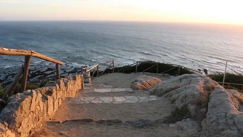 Gentle Ocean waves seen from a rustic viewpoint in Cabo Mondego, in Portugal. Stock Footage 110757124