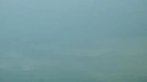 The gentle ripples on the surface of the lake during the day Stock Footage 321797913