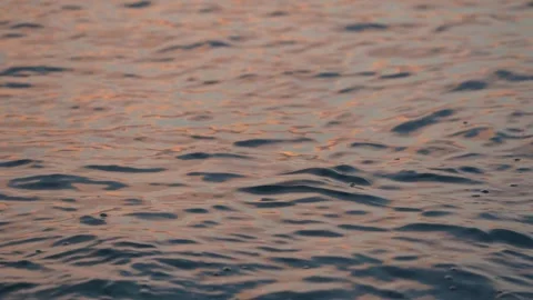 Gentle Rippling Ocean Surface at Dusk Stock Footage 305957908