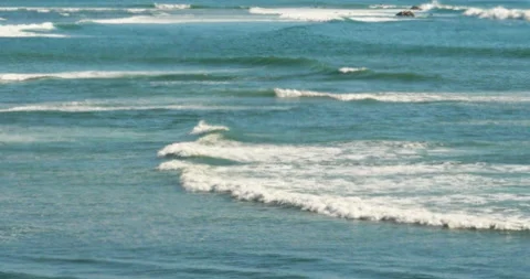 Gentle Rolling Ocean Waves Spread Over The Volcanic Ocean Shoreline Stock Footage 137881467