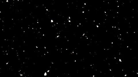 Gentle snow falling motion on black background dynamic winter footage Stock Footage 327567764