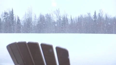 Gentle Snowfall with Chair Stockbeeldmateriaal 148283167
