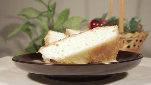 Gentle sponge cake with banana layer. Homemade festive dessert Stock Footage 70211411