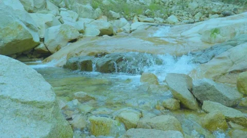 Gentle Stream Flowing Over Rocks | Calming Nature Sounds for Relaxation Stock Footage 286934975