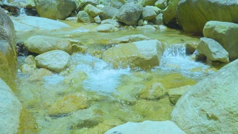 Gentle Stream Flowing Over Rocks | Calming Nature Sounds for Relaxation Stock Footage 286937343