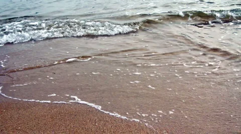 Gentle surf on sandy beach Stock-Footage 3470209