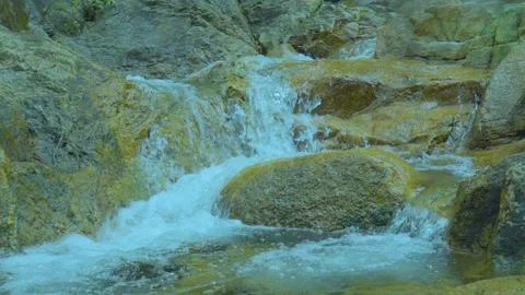 Gentle Waterfall Flowing Over Rocks | Relaxing Nature Sounds for Peace and Calm Stock Footage 286937860