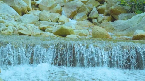 Gentle Waterfall Over Rocks | Calming Nature Sounds of Flowing Water Stock Footage 286934044