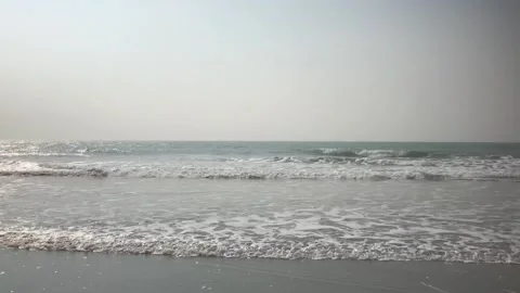 Gentle waves in a beach Stock Footage 131844704