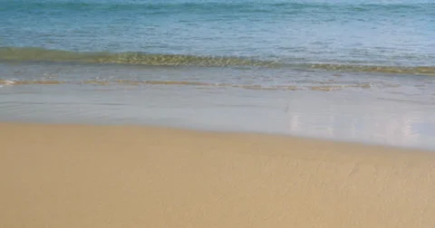 Gentle waves at a beautiful beach - 4K (UltraHD) Stock Footage 39748612