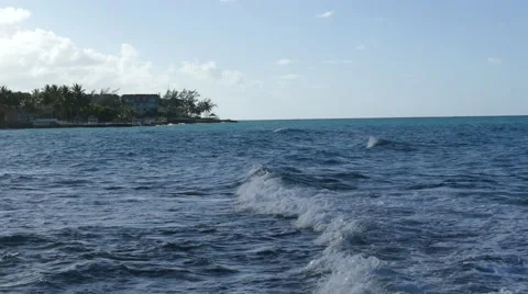 Gentle waves breaking off the coast in the Caribbean, shot in 4K Stock Footage 43766468