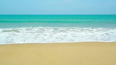 Gentle Waves Breaking on a Pristine Tropical Beach Stock Footage 56489531