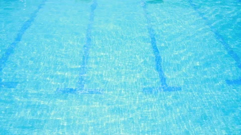 Gentle waves in the clean and clear water pool. Video stock 138451291