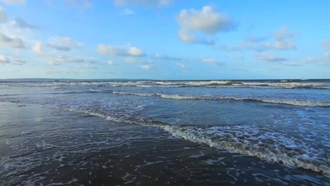 Gentle Waves Crashing onto the beach Stock Footage 104633665