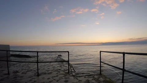 Gentle waves hitting the swimming platform Stock Footage 108689462