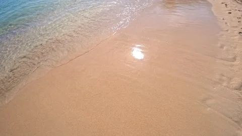 Gentle waves lapping on sandy beach at Cala Marsal, Portocolom Stock Footage 326170054