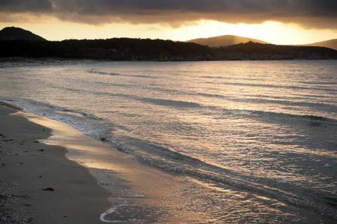 Gentle Waves Lapping the Shore Stock Photos