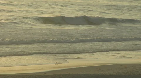 Gentle Waves on the Monterey, CA Beach at Evening Stock Footage 54717810