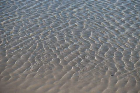 Gentle Waves Pattern on Sandy Beach near Piriapolis, Uruguay Stock Photos