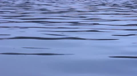 Gentle waves with rain drops Stock Footage 22147474
