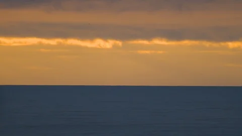 Gentle Waves Rolling in During a Golden Sunset on the Oregon Coast Stock Footage 96007158