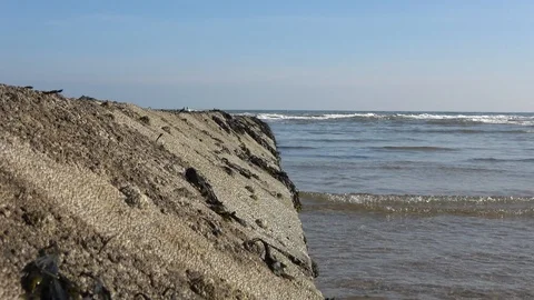 Gentle Waves rolling in passed wave break Stock-Footage 86318466