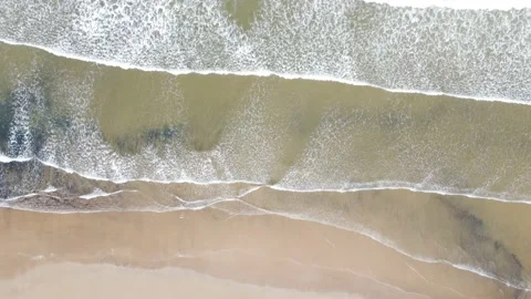 Gentle Waves Rolling on Sandy Beach Top Down View Stock Footage 196403098