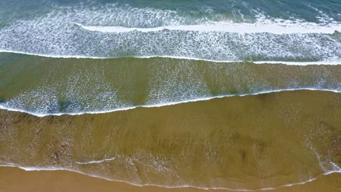 Gentle Waves Rolling on Sandy Beach Top Down View Stock Footage 196409908
