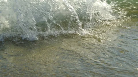 Gentle waves on sandy beach Video stock 212769438