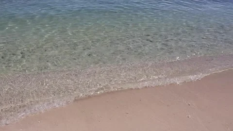 Gentle waves of the shallow emerald sea. Stock Footage 339618289
