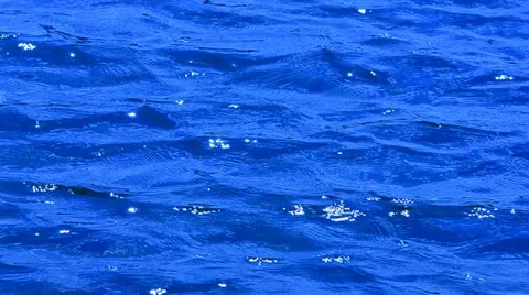 Gentle waves with shimmering reflections Video stock 10900248