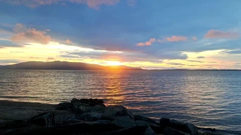 Gentle Waves at Sunset (loop) Video stock 306018303