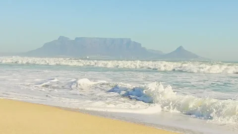 Gentle waves with Table Mountain in the background Stock Footage 132426685