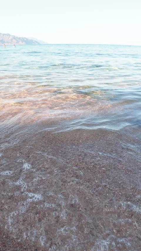 Gentle Waves Washing Over Pebble Shore, Red Sea Stock Footage 343451515