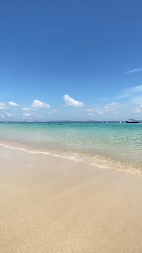 Gentle Waves Washing Onto White Sand Beach Stock Footage 340868802