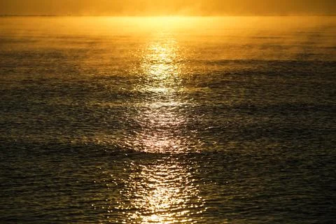 Gentle waves while the sun is rising over the Black Sea in the Obzor resort i Foto stock