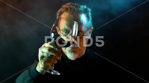 Gentleman testing wines in the winery. Stock Photos