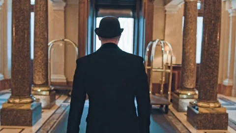 Gentleman walking in a hall Stock Footage 89283529