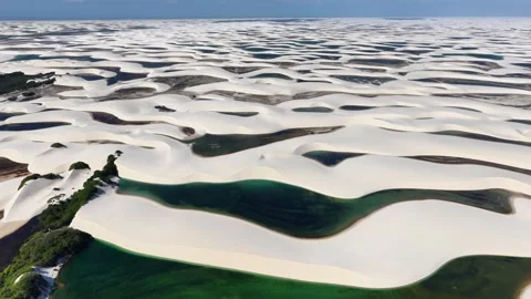 Gently Moving Toward Sculpted Dunes and Green Lagoons in Lençóis Maranhenses Stock Footage 342443426