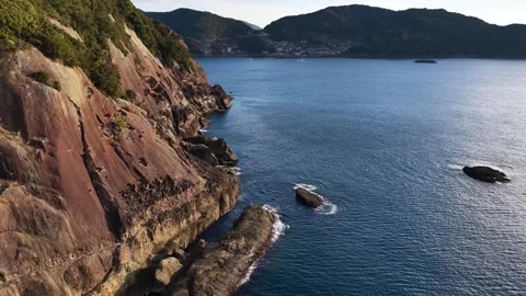 Gently Pulling Back from Onigajo Coast in Kumano, Japan Stock Footage 342239275