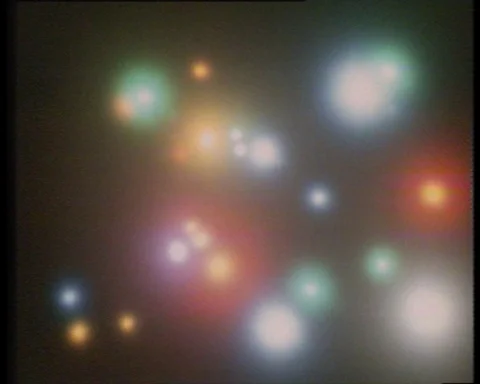 GENUINE 1970s VISUAL EFFECT:  "Colored Lights Moving Forward In Space" Stock Footage 117980379
