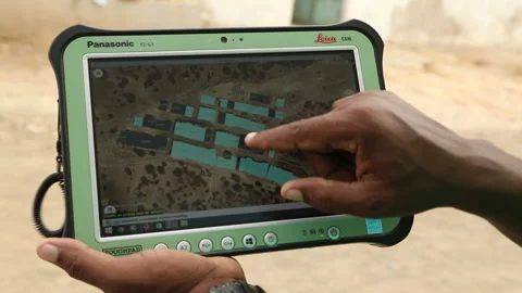 Geo-mapping survey team using touchscreen tablet in Cape Verde, Africa Stock Footage 140152257